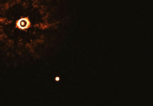 Hito astronómico: un telescopio captura la imagen de otro sistema solar - 1